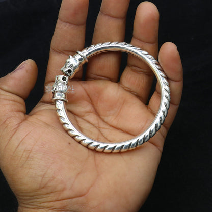 Sterling silver lion face kada bangle bracelet by Tribal Ornaments, featuring tribal belly dance jewelry with detailed lion design.