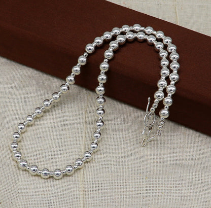 Sterling silver beaded necklace by Tribal Ornaments featuring shiny, modern design perfect for wedding or stylish casual wear.