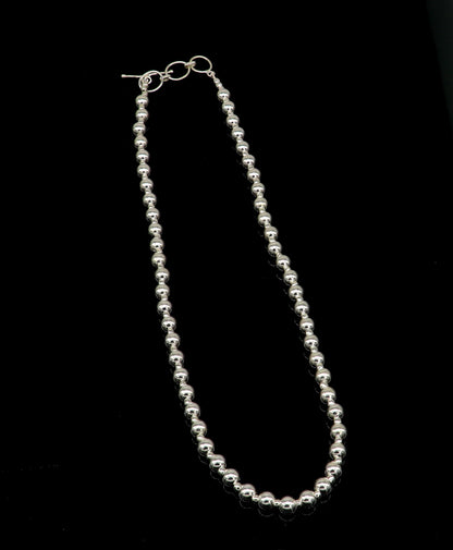 Sterling silver beaded necklace with shiny, plain design, stylish trendy jewelry suitable for weddings and brides, by TRIBAL ORNAMENTS.