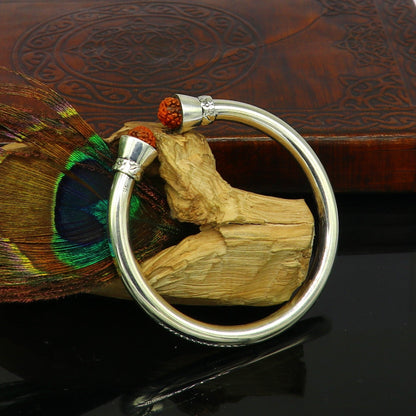 Sterling silver bangle cuff with shiny Rudraksha beads, unisex tribal jewelry, flexible design, handcrafted by TRIBAL ORNAMENTS.