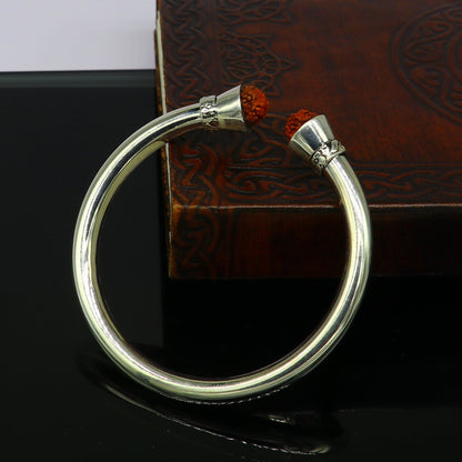 Sterling silver Rudraksha beads bangle cuff bracelet by Tribal Ornaments, featuring shiny, bright, flexible unisex jewelry design.