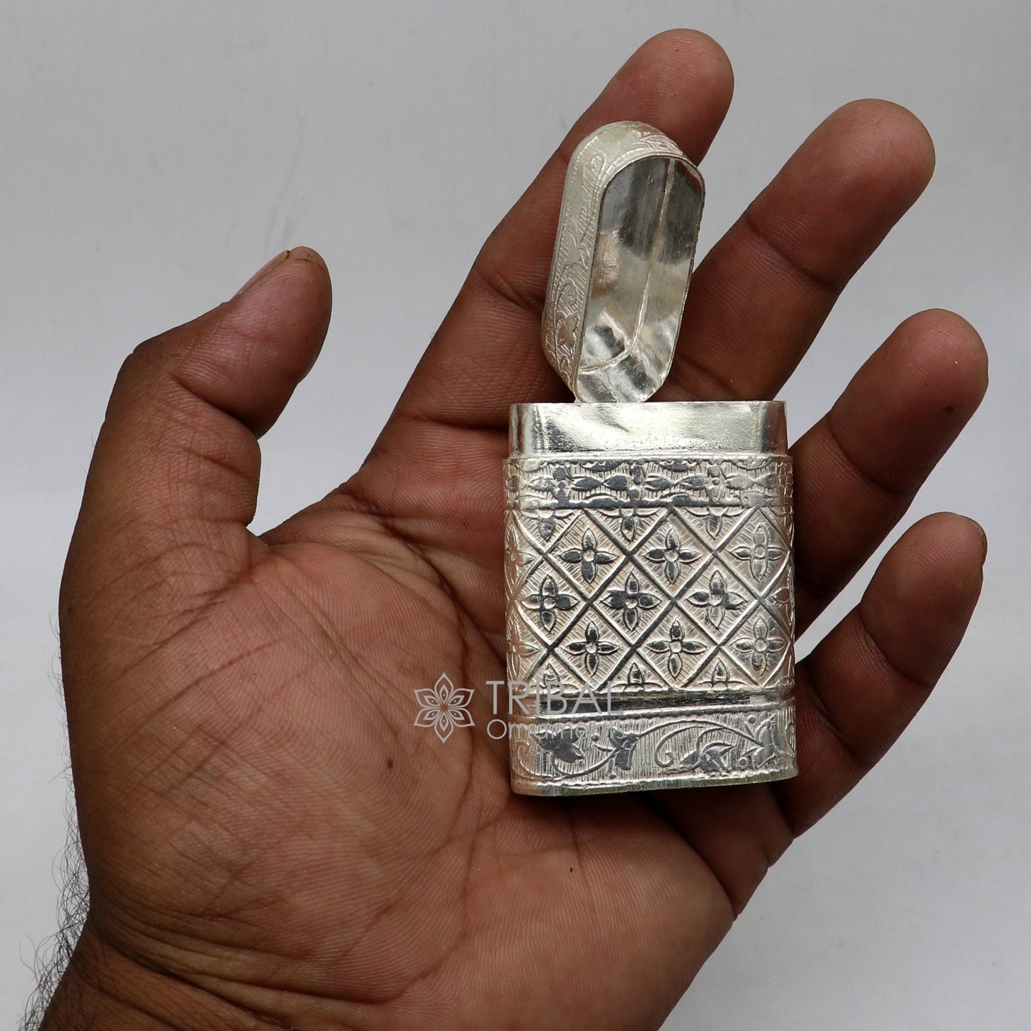 Sterling silver floral 2-in-1 royal trinket and tobacco box by TRIBAL ORNAMENTS, featuring intricate floral design.