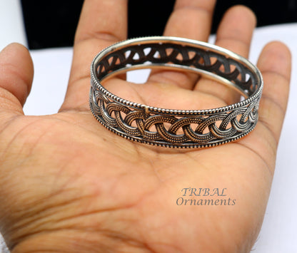Sterling silver flower design bangle bracelet from Tribal Ornaments, part of wedding jewelry bridal collection.
