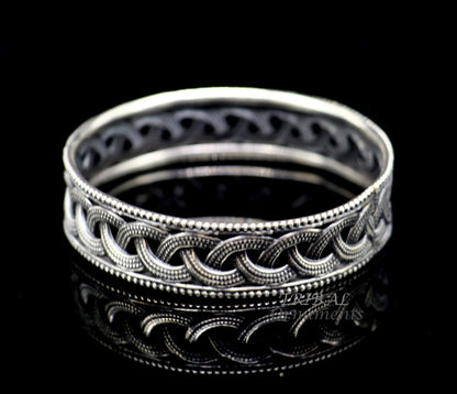 Sterling silver flower design bangle bracelet from Tribal Ornaments, elegant wedding jewelry for brides.