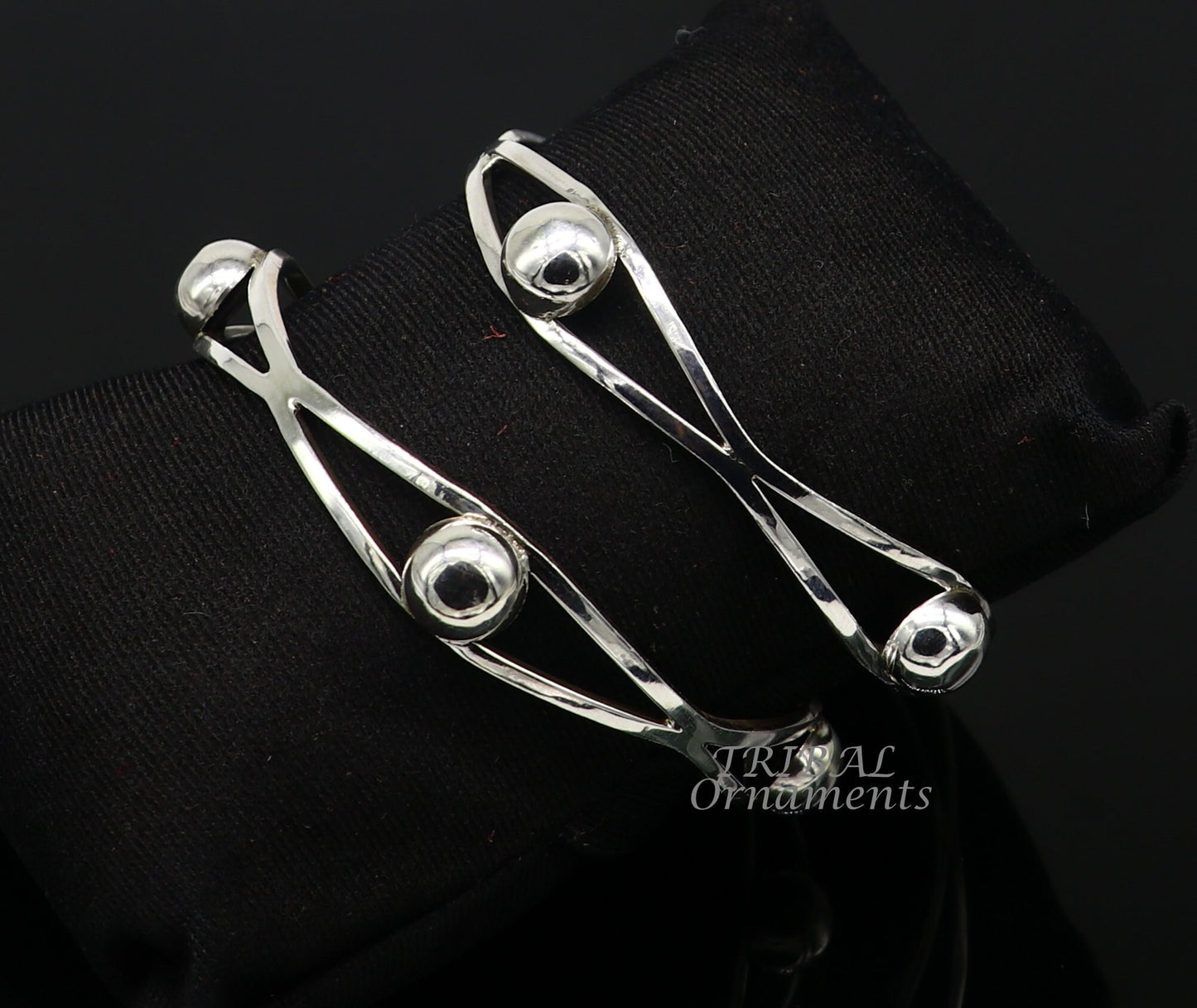 Sterling silver ball design bangle bracelet from TRIBAL ORNAMENTS, featuring a handcrafted floral style, perfect for wedding jewelry.
