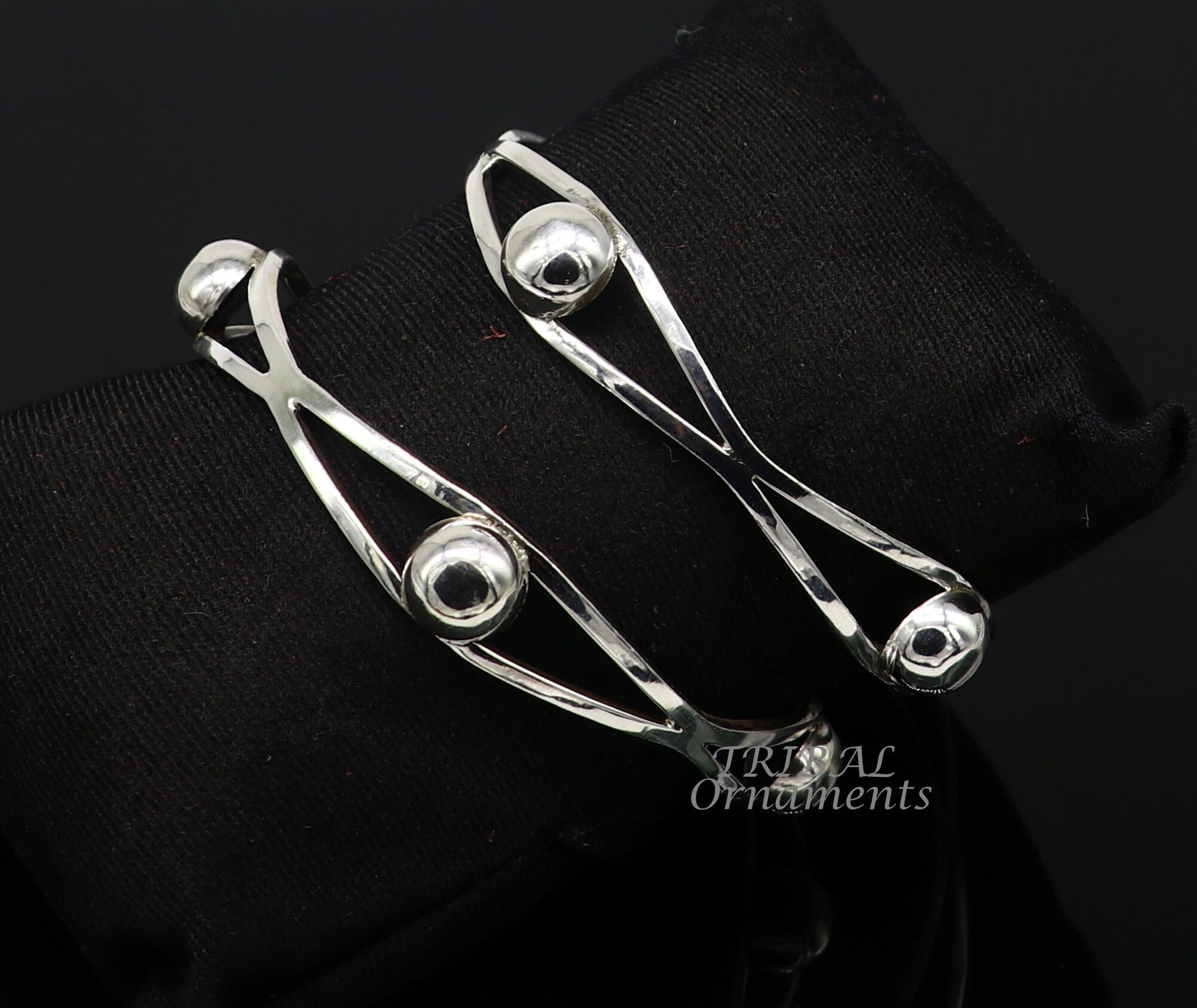 Sterling silver ball design bangle bracelet from TRIBAL ORNAMENTS, featuring a handcrafted floral style, perfect for wedding jewelry.