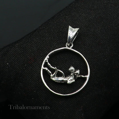 925 sterling silver Lord Hanuman pendant featuring flying Hindu god design, unisex jewelry by TRIBAL ORNAMENTS.