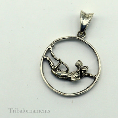 Sterling silver Lord Hanuman pendant featuring flying Hindu god design, unisex jewelry by TRIBAL ORNAMENTS.