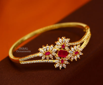 Sterling silver gold-polished cuff bracelet with cubic zirconia stones, handcrafted tribal jewelry for girls.