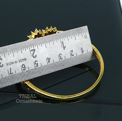 Sterling silver gold-polished cubic zirconia cuff bracelet, handmade tribal jewelry bangle for girls with customizable design.