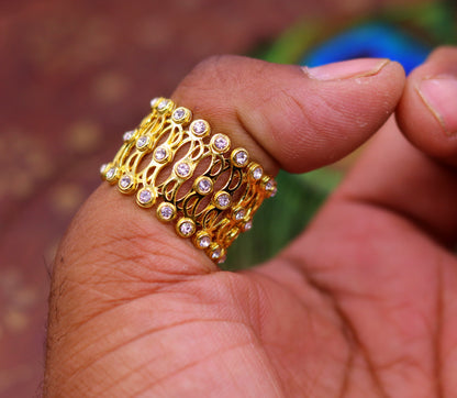 Sterling silver and gold polished handmade adjustable bangle or ring band, customizable jewelry for girls and women from India.