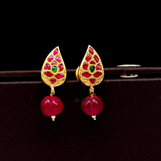 Sterling silver gold polished kundan flower-shaped stud earrings with green and red stones, trendy modern jewelry by TRIBAL ORNAMENTS.