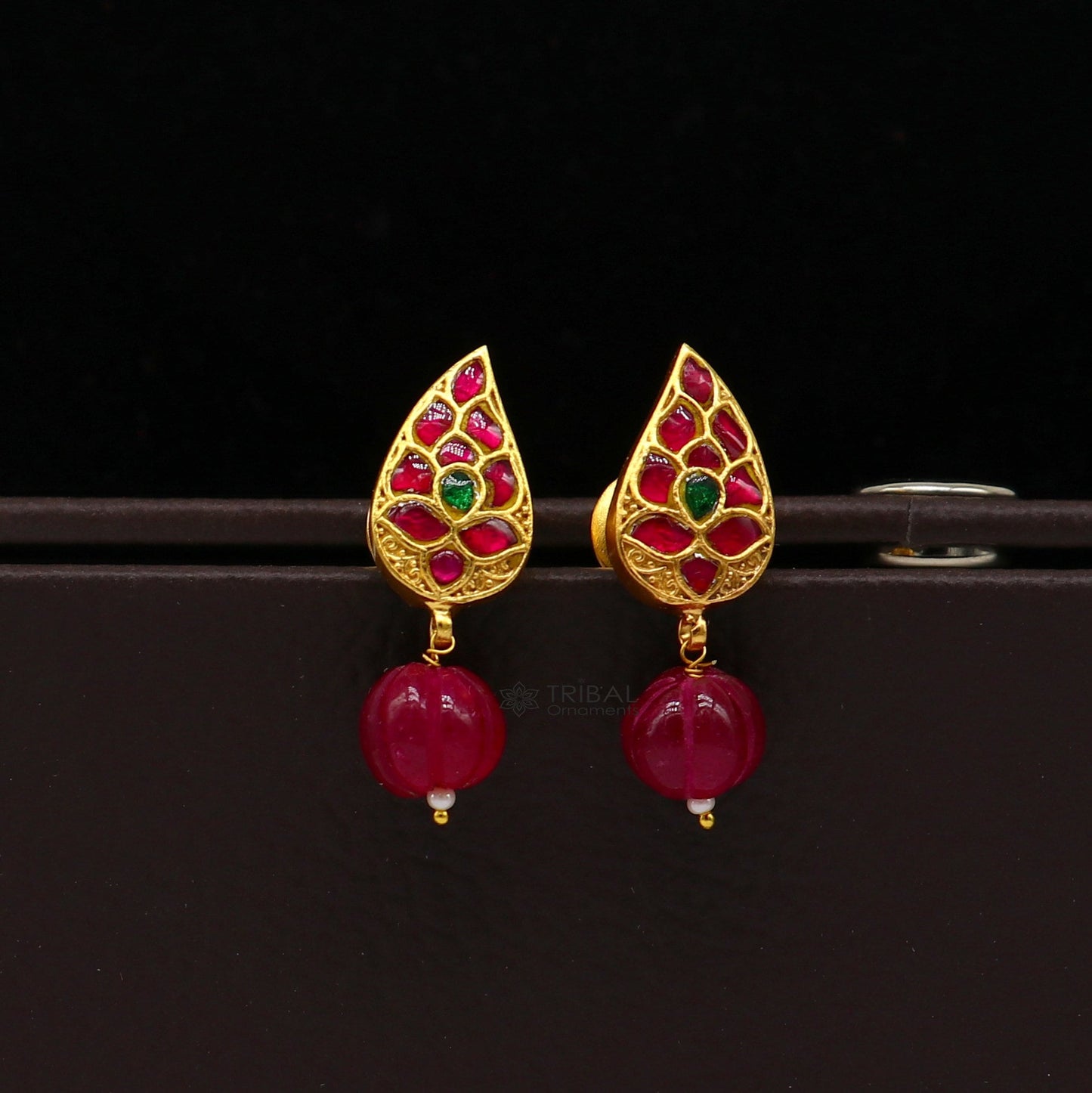 Sterling silver gold-polished kundan flower-shaped stud earrings with green and red stones, modern trendy jewelry by TRIBAL ORNAMENTS.