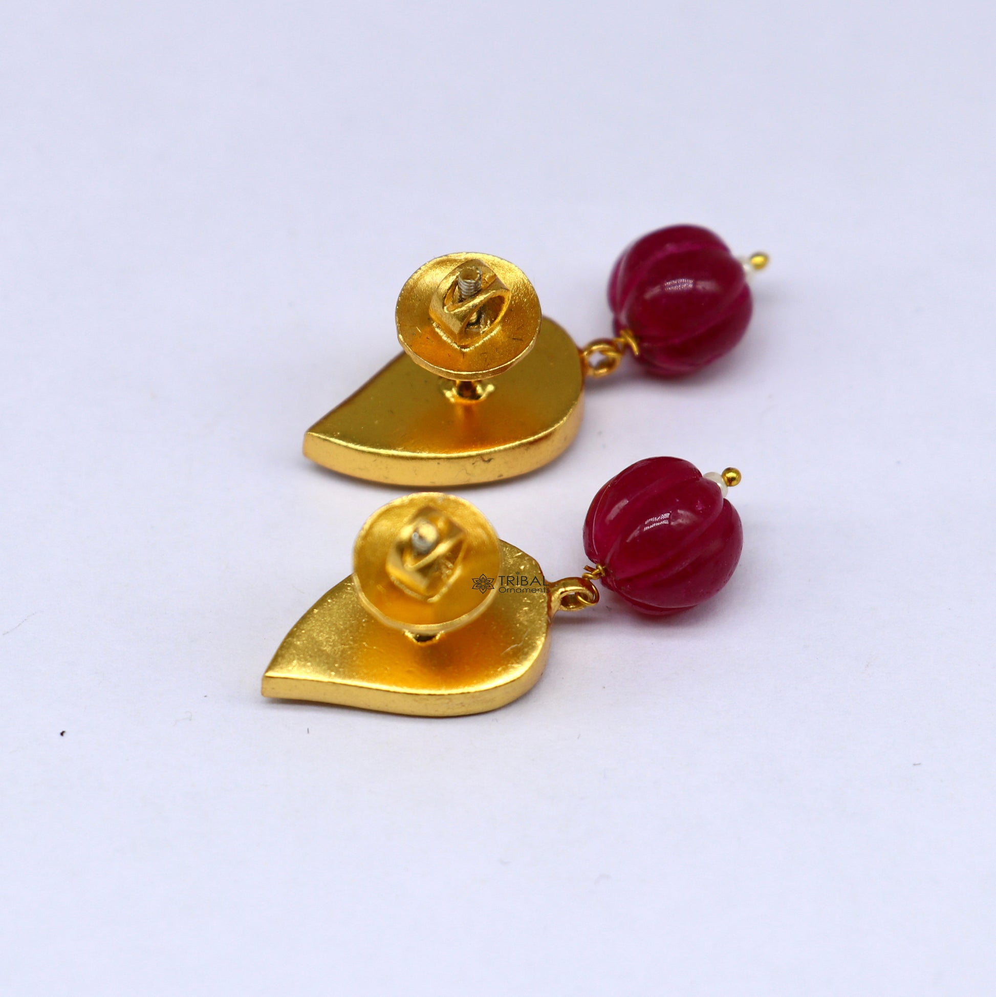 Sterling silver gold-polished Kundan stud earrings with green and red stones in a floral design, modern trendy jewelry by TRIBAL ORNAMENTS