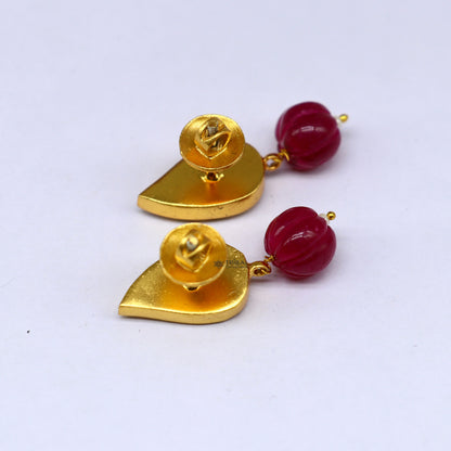 Sterling silver gold-polished Kundan stud earrings with green and red stones in a floral design, modern trendy jewelry by TRIBAL ORNAMENTS