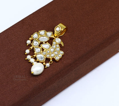 Sterling silver and gold-plated peacock pendant with red and green stone drops, featuring a stylish and intricate design.