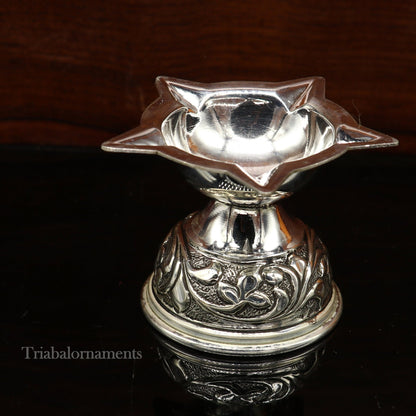 Sterling silver oil lamp with intricate chitai and kandrai work, traditional Deepak for Diwali puja, temple decor by Tribal Ornaments.