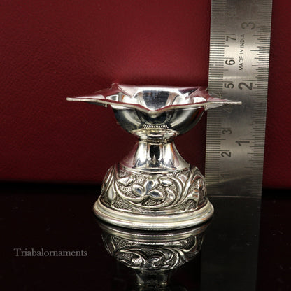 925 sterling silver oil lamp with intricate chitai and kandrai work, traditional deepak for Diwali puja, crafted by TRIBAL ORNAMENTS.