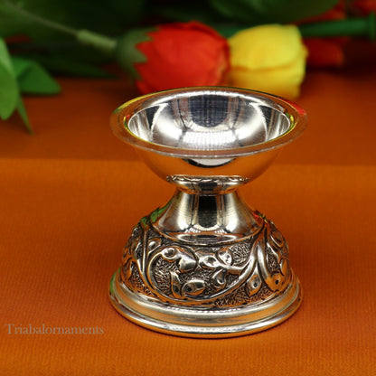 Sterling silver oil lamp with intricate chitai and kandrai work, traditional Deepak for Diwali puja and temple decoration.