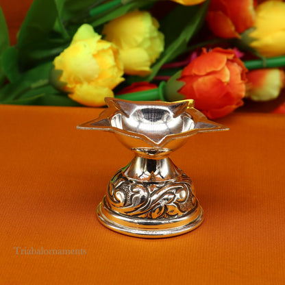 Sterling silver oil lamp with intricate Chitai and Kandrai work, traditional Deepak for Diwali puja by Tribal Ornaments