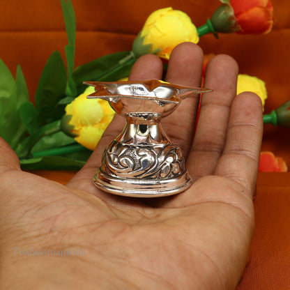 925 sterling silver oil lamp with intricate chitai and kandrai work, traditional silver Deepak for Diwali puja decor.