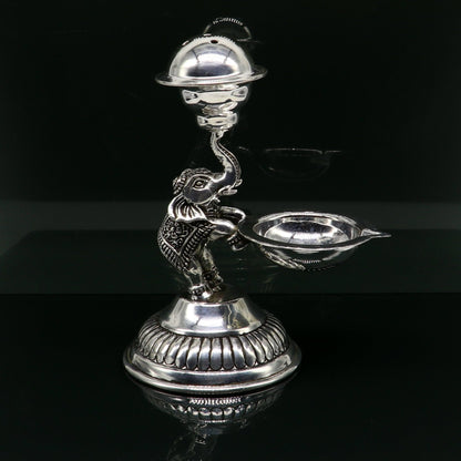 925 sterling silver handcrafted elephant oil lamp and incense holder, traditional puja utensil with detailed silver work by TRIBAL ORNAMENTS