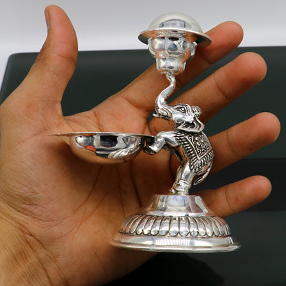 Handcrafted 925 sterling silver elephant oil lamp and incense stick holder by TRIBAL ORNAMENTS, traditional puja utensil and decorative art piece.
