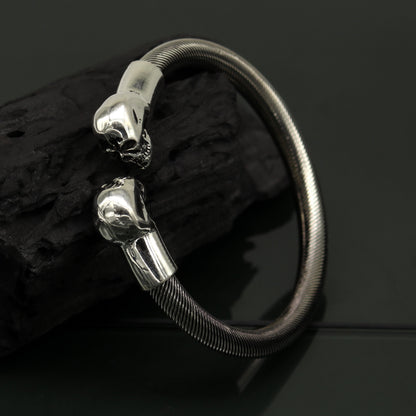 Sterling silver hip-hop skull design bangle bracelet, unisex tribal jewelry with personalized engraving, stylish and bold accessory.
