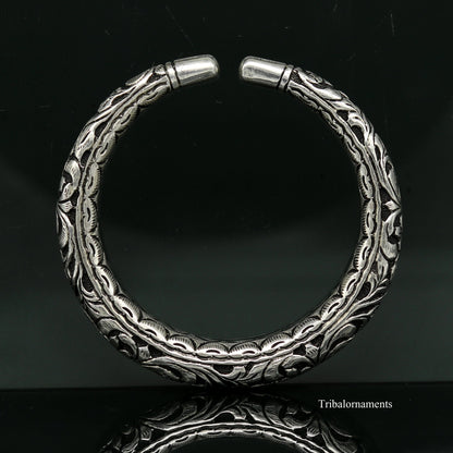 Sterling silver handcrafted chitai work bangle cuff with oxidized tribal design, vintage-style tribal jewelry bracelet.