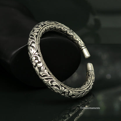 Sterling silver handcrafted chitai work bangle cuff bracelet with oxidized vintage tribal design, stylish and intricate jewelry.
