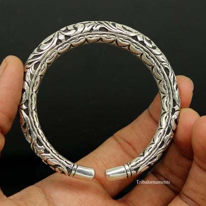Sterling silver handcrafted chitai work bangle cuff with oxidized vintage tribal design by TRIBAL ORNAMENTS.