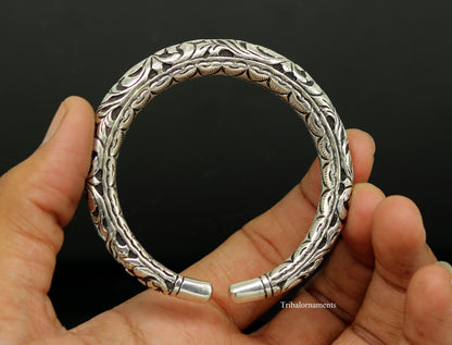 Sterling silver tribal bangle bracelet with handcrafted chitai work, oxidized vintage design, and customized stylish tribal jewelry.