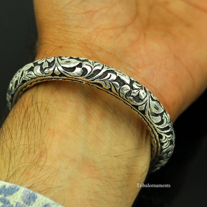 Sterling silver tribal bangle bracelet with handcrafted chitai work, oxidized vintage design, and customized tribal jewelry style.