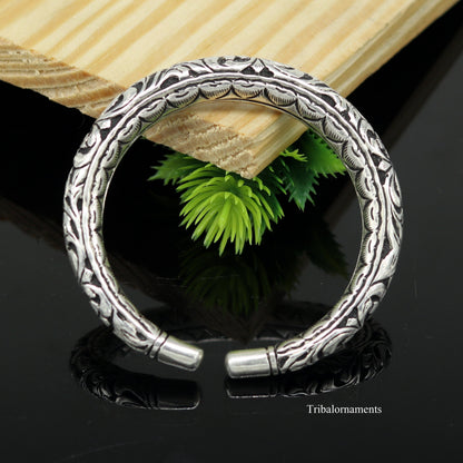 Sterling silver handcrafted tribal bangle bracelet with oxidized vintage design and chitai work, stylish tribal jewelry.