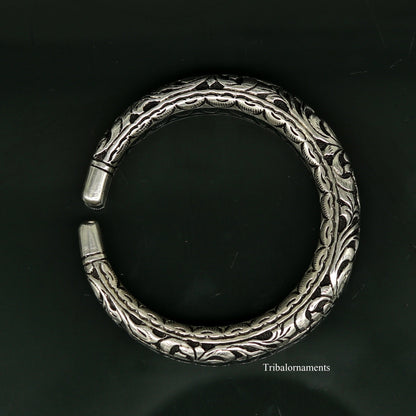 Sterling silver bangle bracelet with handcrafted chitai work, oxidized vintage tribal design, stylish and customized tribal jewelry.