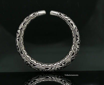 Handcrafted 925 sterling silver tribal bangle bracelet with oxidized vintage design and chitai work, stylish tribal jewelry.