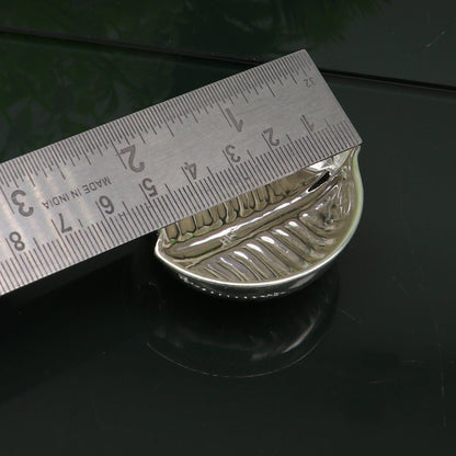 Sterling silver handcrafted tilak and sindur bowl with intricate tribal design, used for puja and religious rituals.