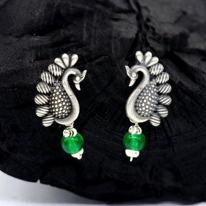 925 sterling silver handcrafted peacock design stud earring with modern stylish drop dangle for party wear and gifting.