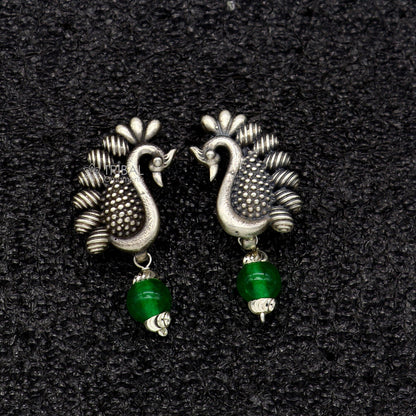 925 sterling silver handcrafted peacock design stud earring with drop dangle style for modern party wear and gifting.