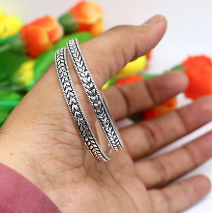 Handcrafted 925 sterling silver floral design bangles bracelet by TRIBAL ORNAMENTS, featuring intricate tribal belly dance jewelry style.