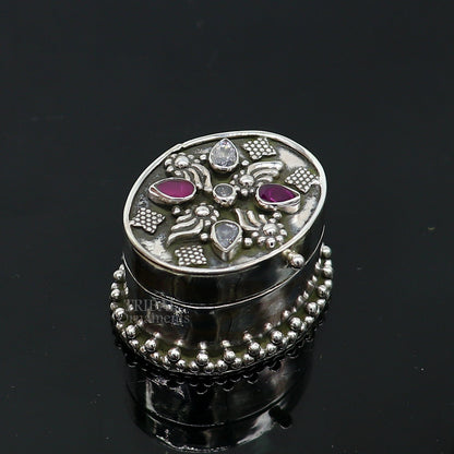 Handcrafted 925 sterling silver oval trinket box with red stone accents, ideal for jewelry, kajal, or sindur storage.