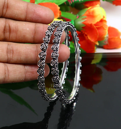 Sterling silver tribal bangles with handcrafted rose flower design, stylish belly dance jewelry from TRIBAL ORNAMENTS.