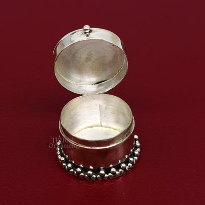 925 silver handcrafted round trinket box with red stone accents, ideal for jewelry, kajal, or sindur storage, from Tribal Ornaments.