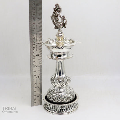 Handcrafted 925 silver vintage oil lamp or Deepak with antique design, traditional puja article, and decorative silver candle stand.