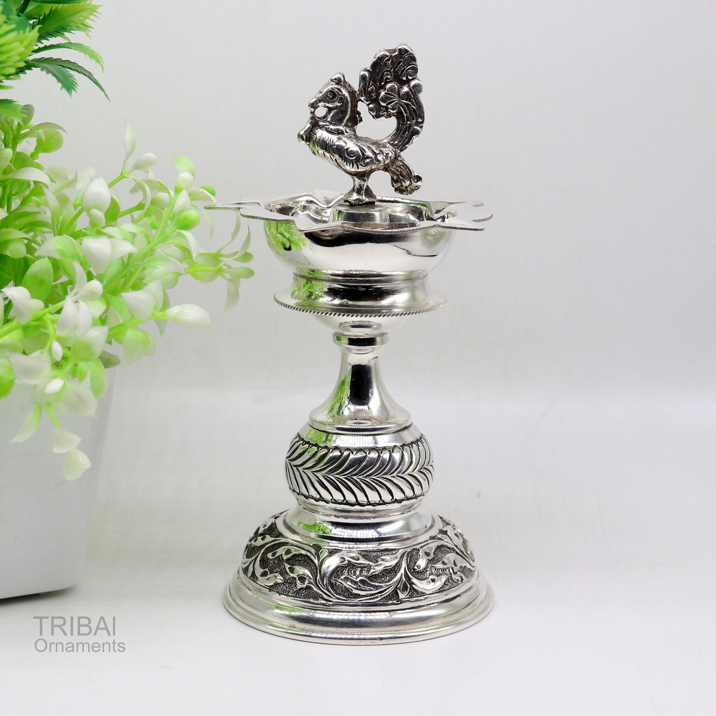 Handcrafted 925 sterling silver vintage oil lamp or candle stand, tribal Deepak with detailed puja utensils and silver figurine.