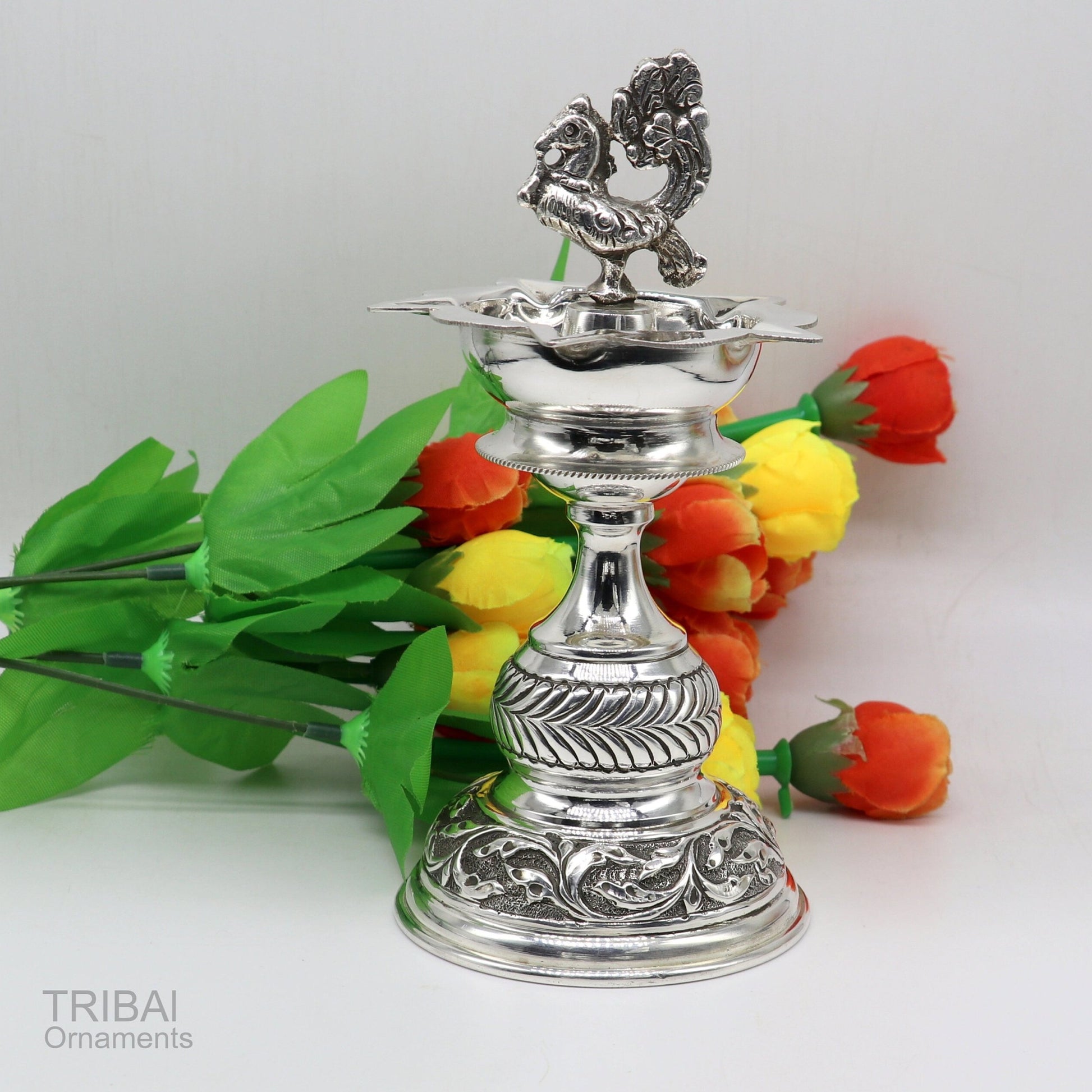 Handcrafted 925 sterling silver vintage oil lamp or candle stand, traditional Deepak for puja, with intricate silver detailing.
