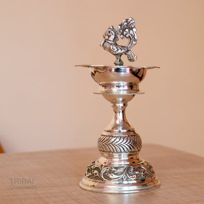 Handcrafted 925 sterling silver vintage oil lamp or candle stand with intricate design, silver Deepak for puja, from Tribal Ornaments.