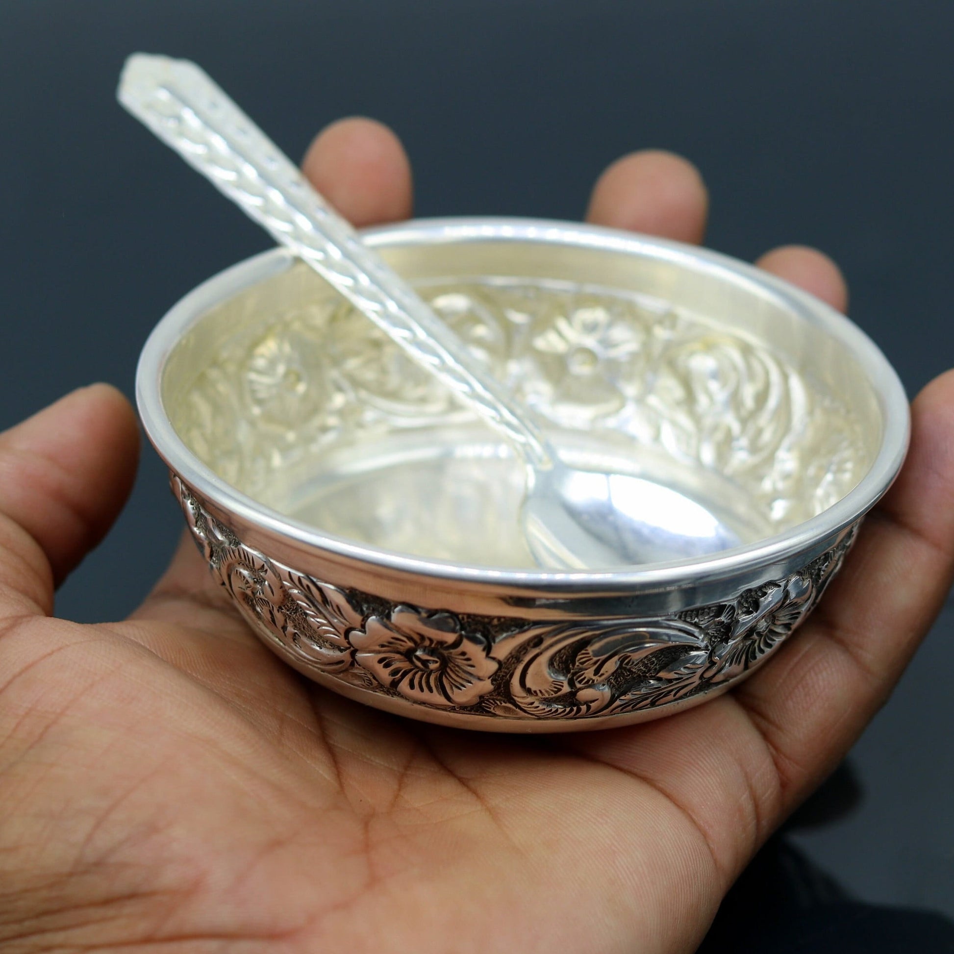 Handcrafted 925 sterling silver bowl and spoon set by TRIBAL ORNAMENTS, featuring antibacterial properties for baby rice ceremonies