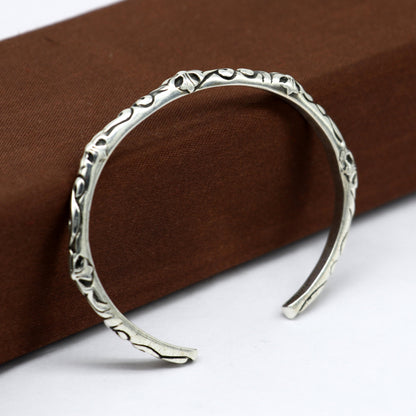 Sterling silver tribal bangle cuff for men and women, featuring a handcrafted, glossy, solid design by Tribal Ornaments.
