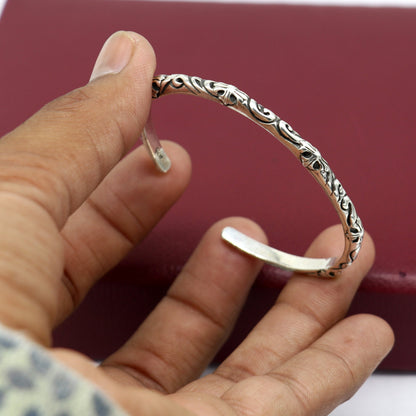 925 sterling silver tribal bangle cuff for men and women, featuring handcrafted design and glossy finish, ideal for gifting.